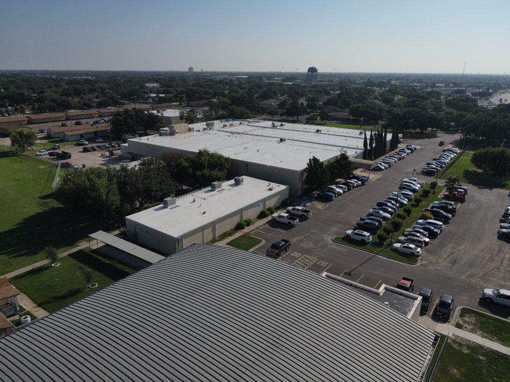 Harlingen CISD 120,000 SF commercial roof replacement by American Contracting USA